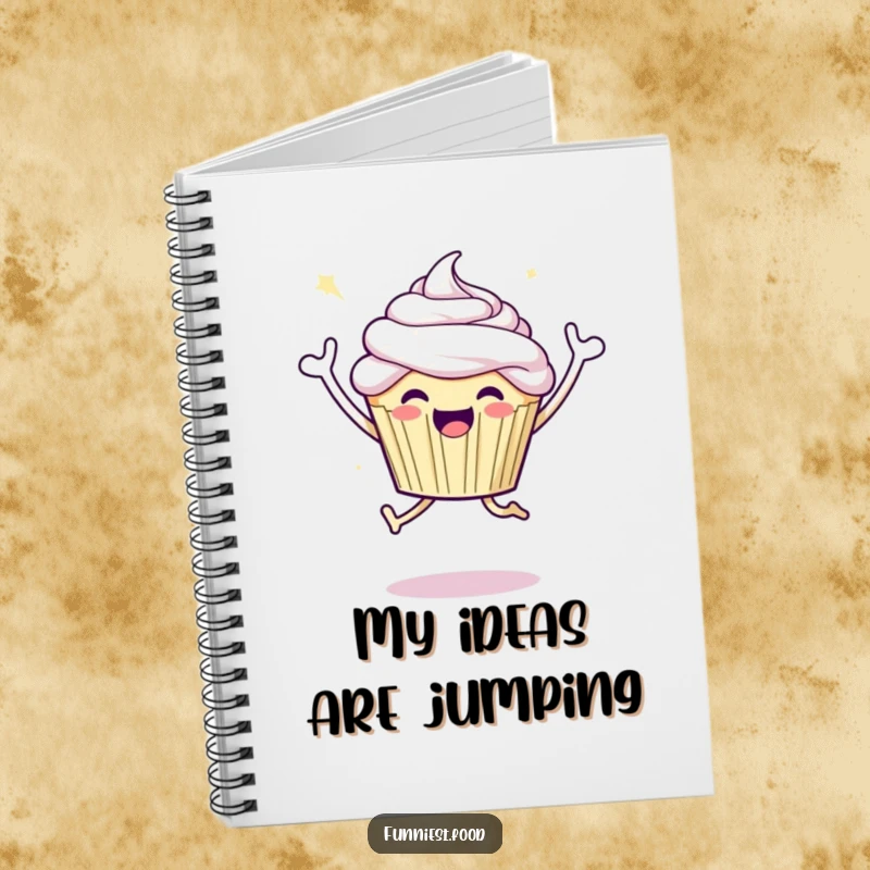 Funny notebook featuring a joyful cupcake character doing a celebratory jump, ideal for journaling or celebrating successes.