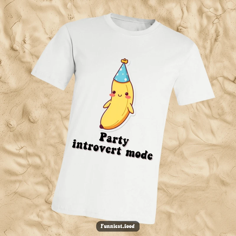 Funny shy banana with a tiny party hat, looking bashful on this graphic t-shirt, a charming and humorous present.