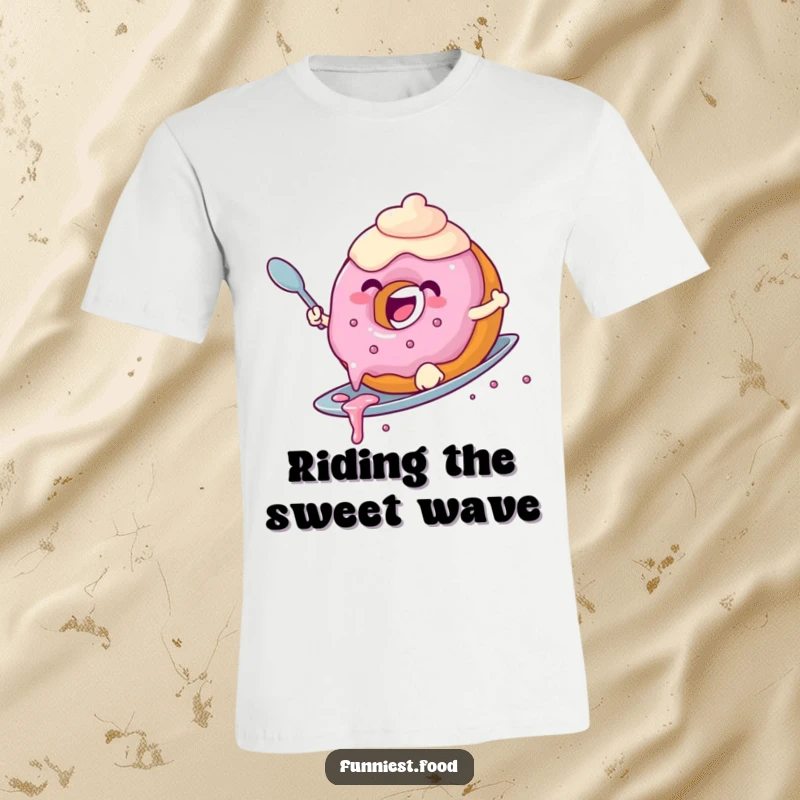 Funny donut t-shirt depicting a joyful donut with dripping frosting surfing a spoon, ideal for a fun gift.